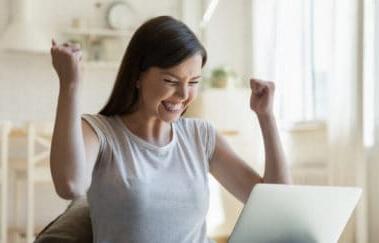 Woman celebrates passing the real estate exam in California